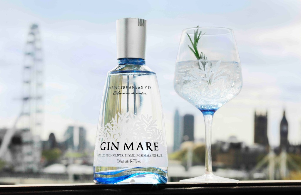 Gin Mare bottle and G&T with London skyline